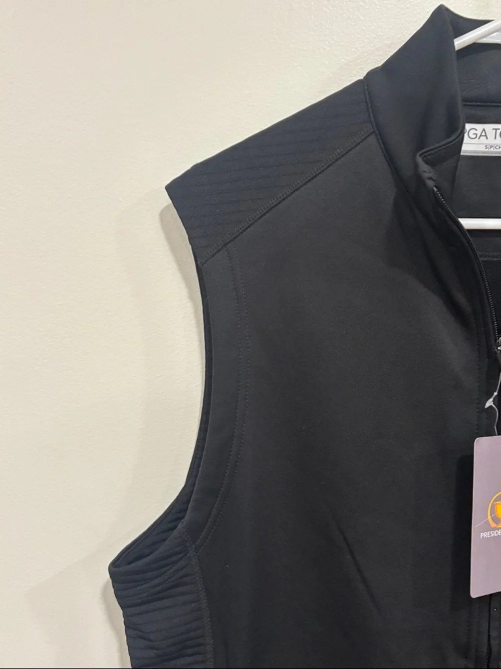 PGA TOUR Black Presidents Cup Sleeveless Zip Vest with Yellow Logo